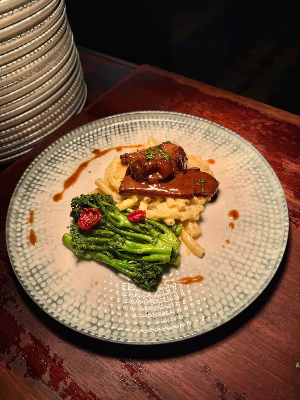 Braised short rib over mac and cheese, broccolini