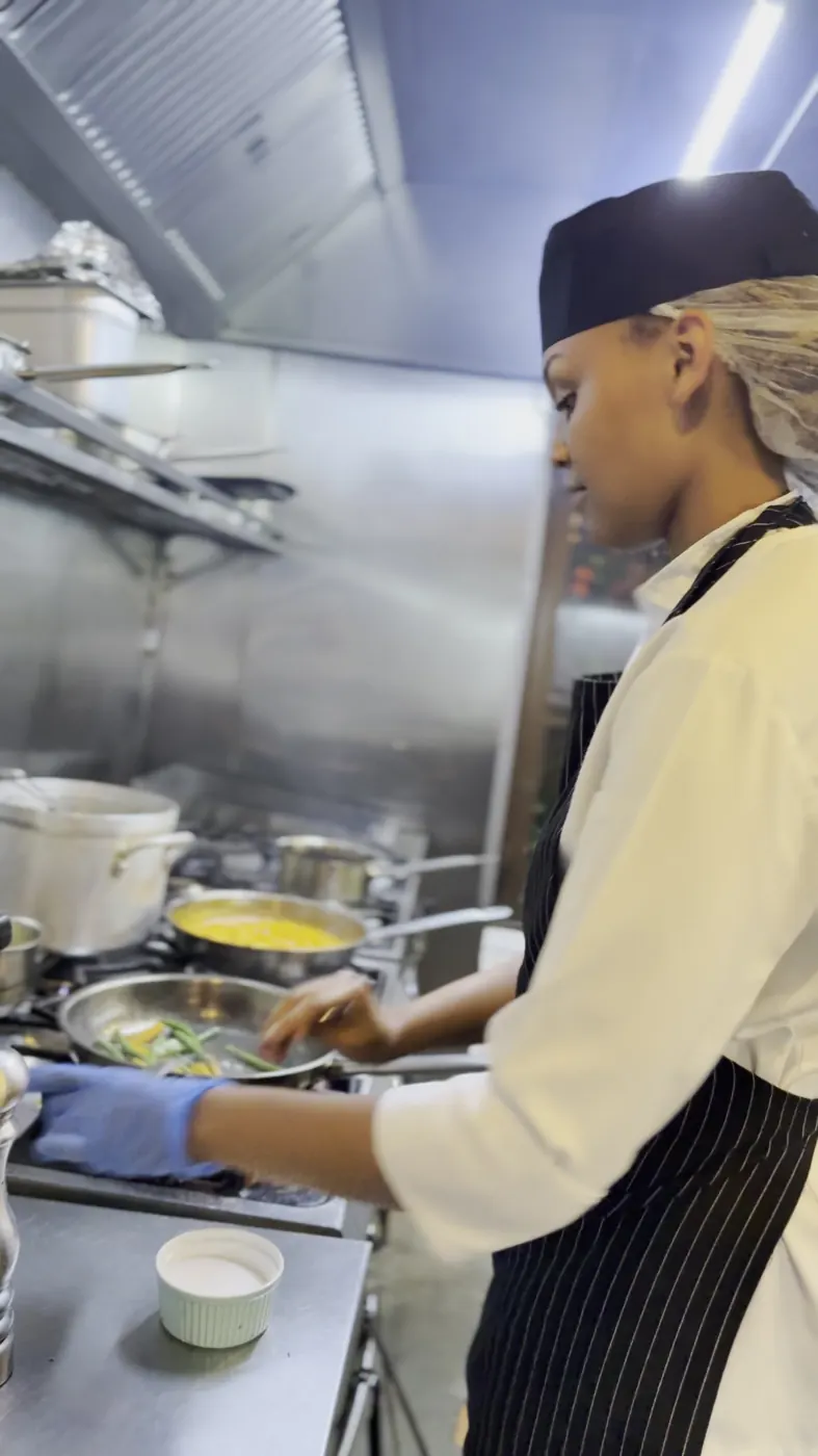 At the stove